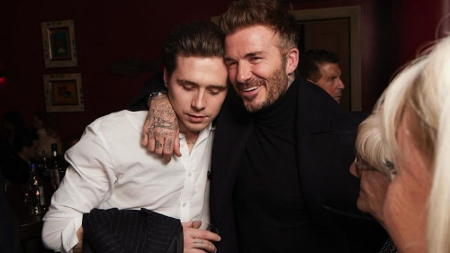 Brooklyn Beckham với David Beckham