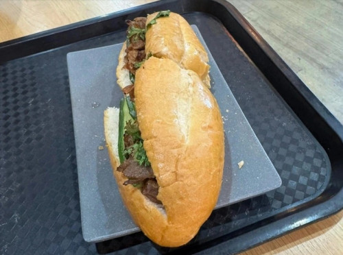 Vụ 208.000 đồng một ổ bánh mì: Cảng hàng không Nội Bài báo cáo gì?- Ảnh 1.