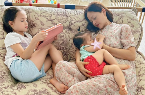 Lan Phương ly hôn chồng Tây, một mình nuôi 2 con.